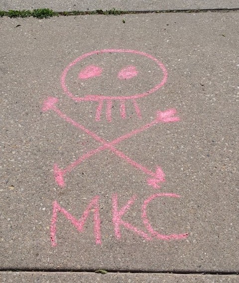 MKC skull + cross bones